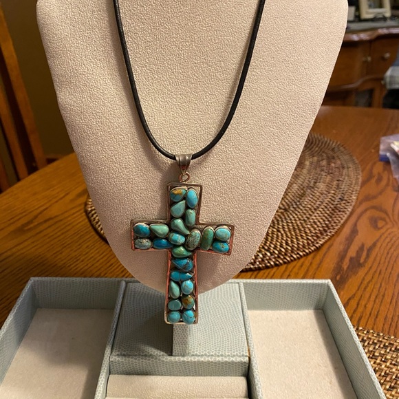 Artisan Jewelry - Turquoise stone cross shaped pendant on leather Artisan Jewelry - Turquoise stone cross shaped pendant on leather